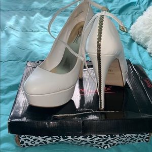 White detailed high heels